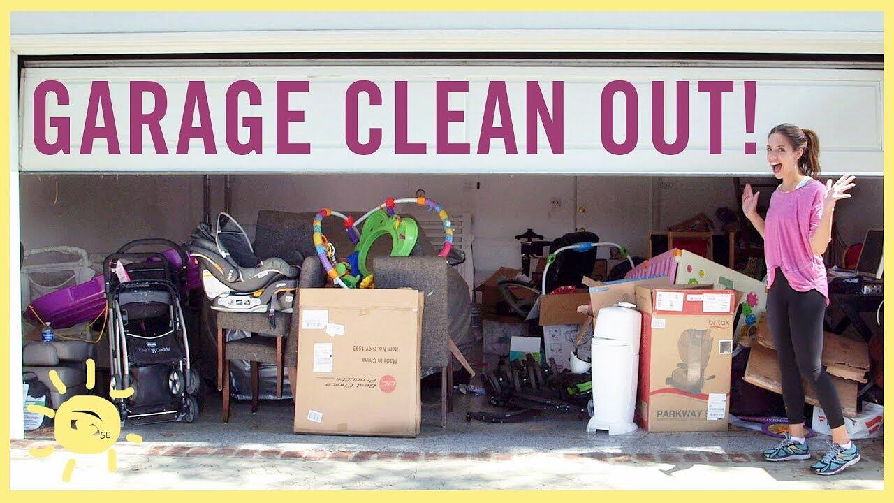 A garage being sorted into donate, recycle and dump piles